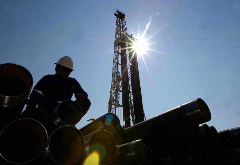 Oil prices go up on dollar weakness