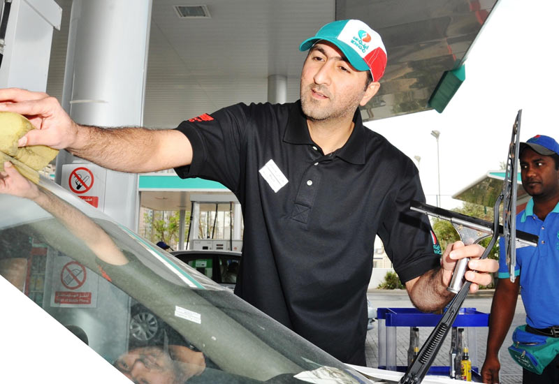 ENOC head office staff work the garage forecourts