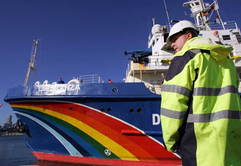 Greenpeace vessel in stand-off with Danish warship